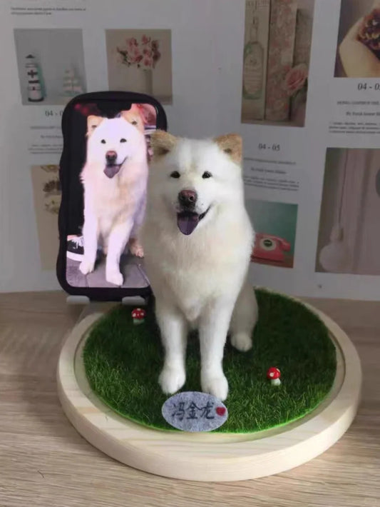 White dog figurine on a grassy base with a phone holder displaying another dog's photo.