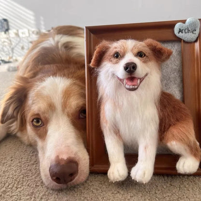 Dog looking at a photo frame with a smaller dog inside, both on a carpeted floor.