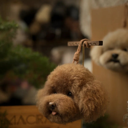Small brown dog toy hanging from a stick with a blurred background