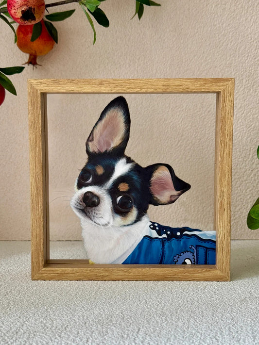 Framed artwork of a dog with a blue pattern on a beige background