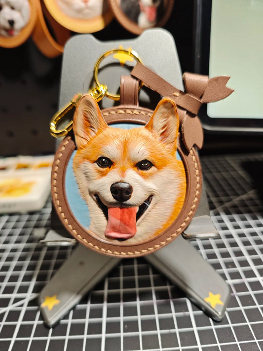 Keychain with a dog's face design on a stand